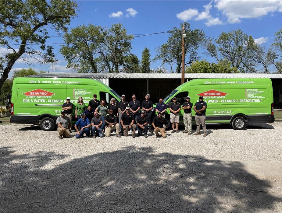 Photo of SERVPRO of North Fort Worth team in front of two SERVPRO vans at Blue Bayou in Fort Worth